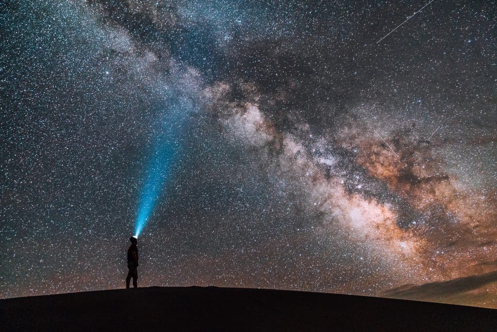 man looking at the sky, galaxies, space