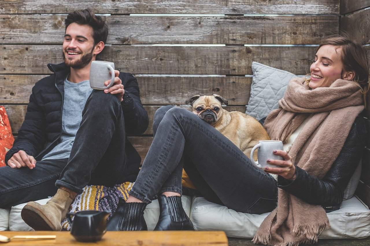 man and woman drinking coffee