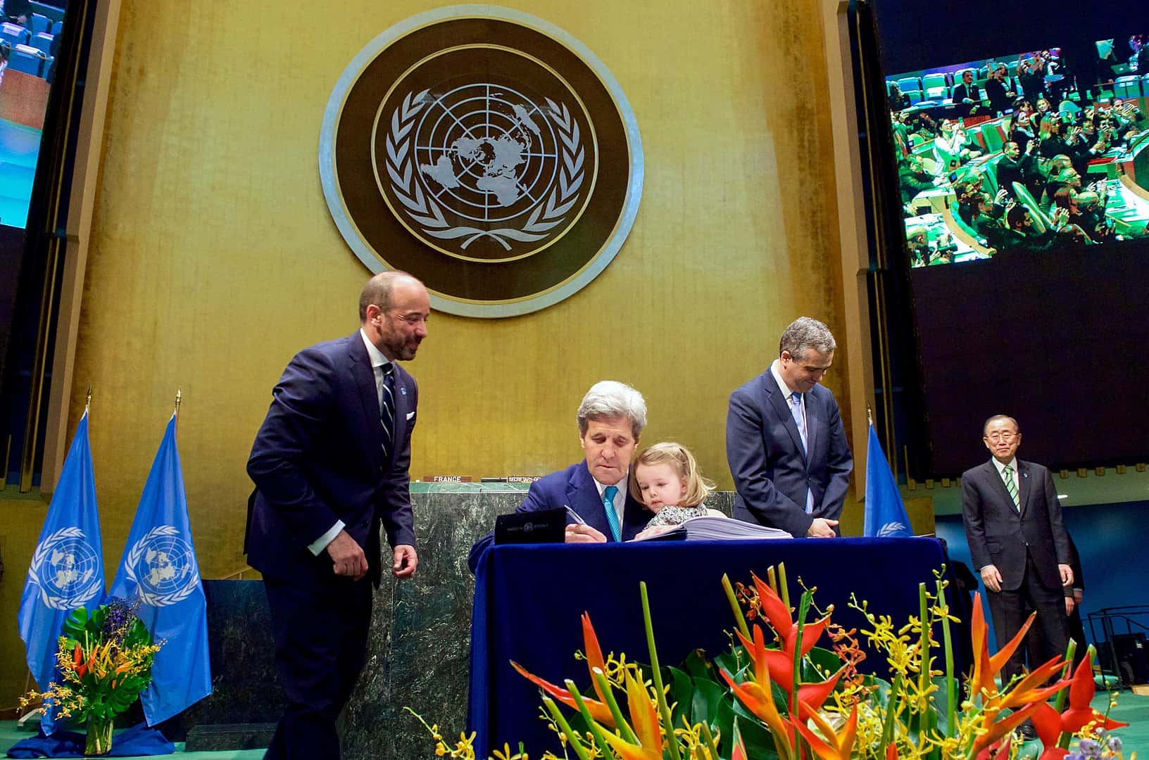 Secretary of State John Kerry signs the Paris Agreement in 2016.