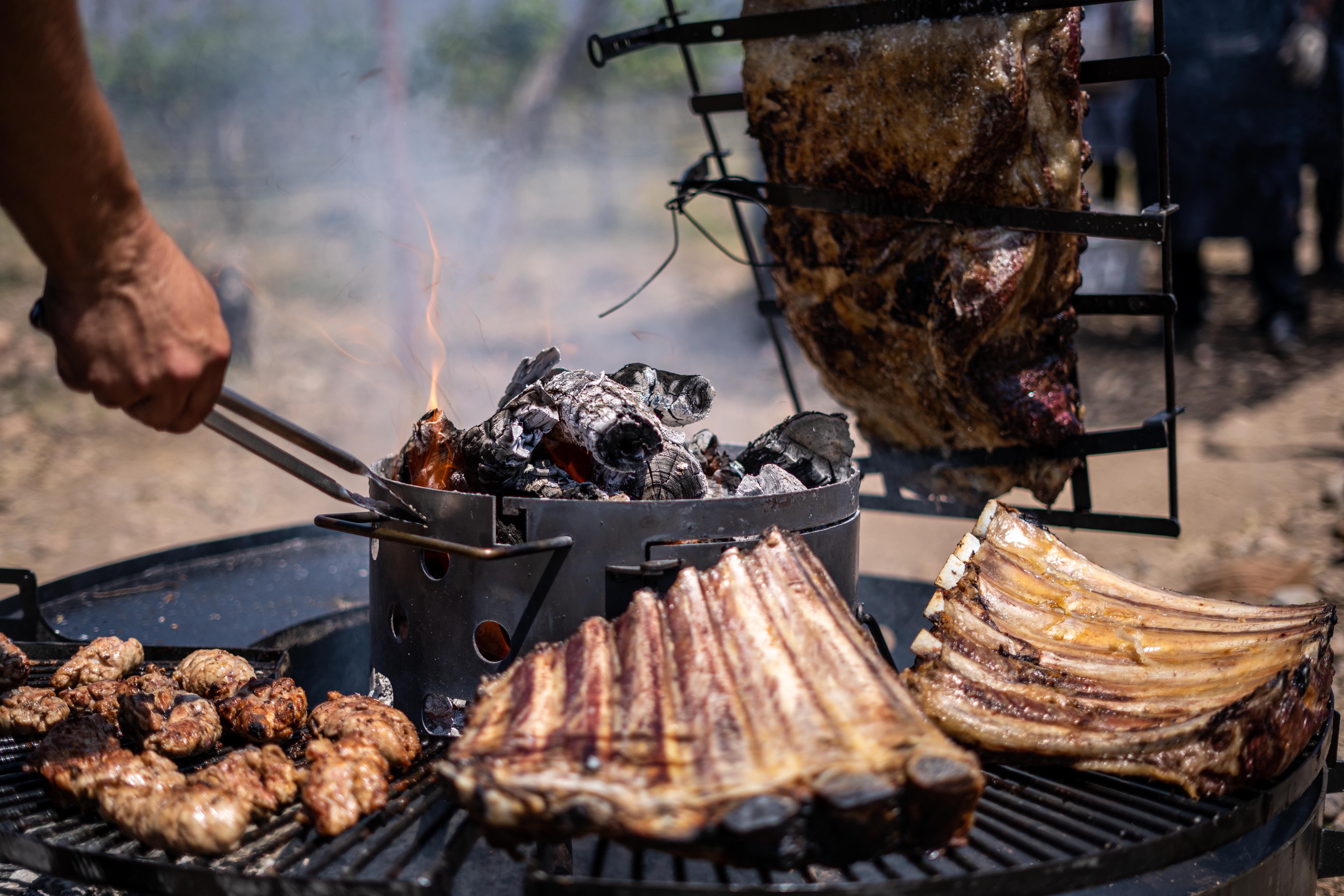 Traditional Argentine ribs grilled with charcoal and fire, Argentine cuisine