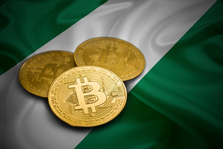 gold crypto currency bitcoin on nigeria country flag
