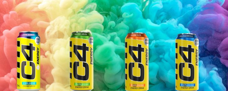 four C4 energy drink cans against a colorful smoke background