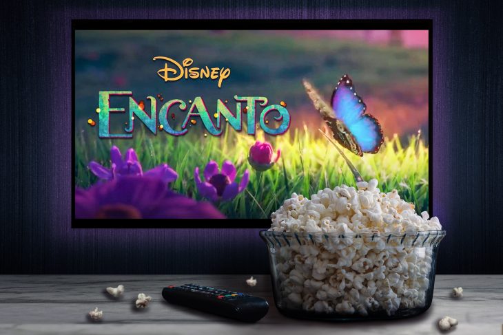 Disney Encanto on TV with popcorn
