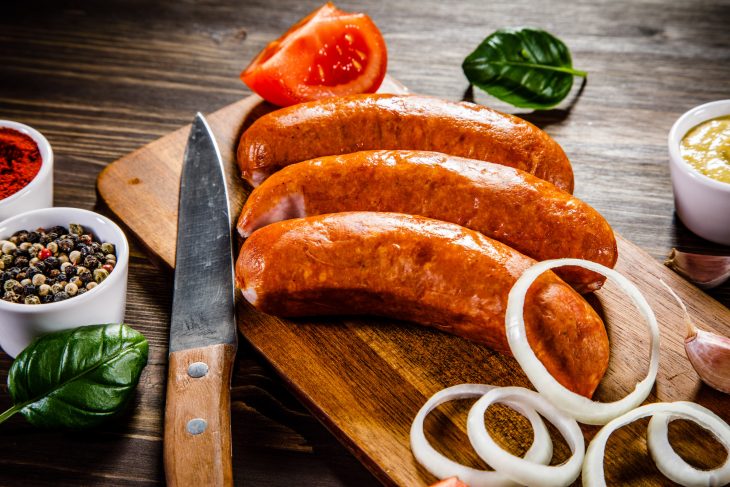 Kielbasa sausages with spies and vegetables