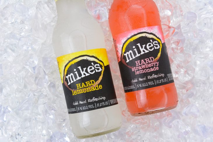 Two bottles of Mikes Hard Lemonade on ice