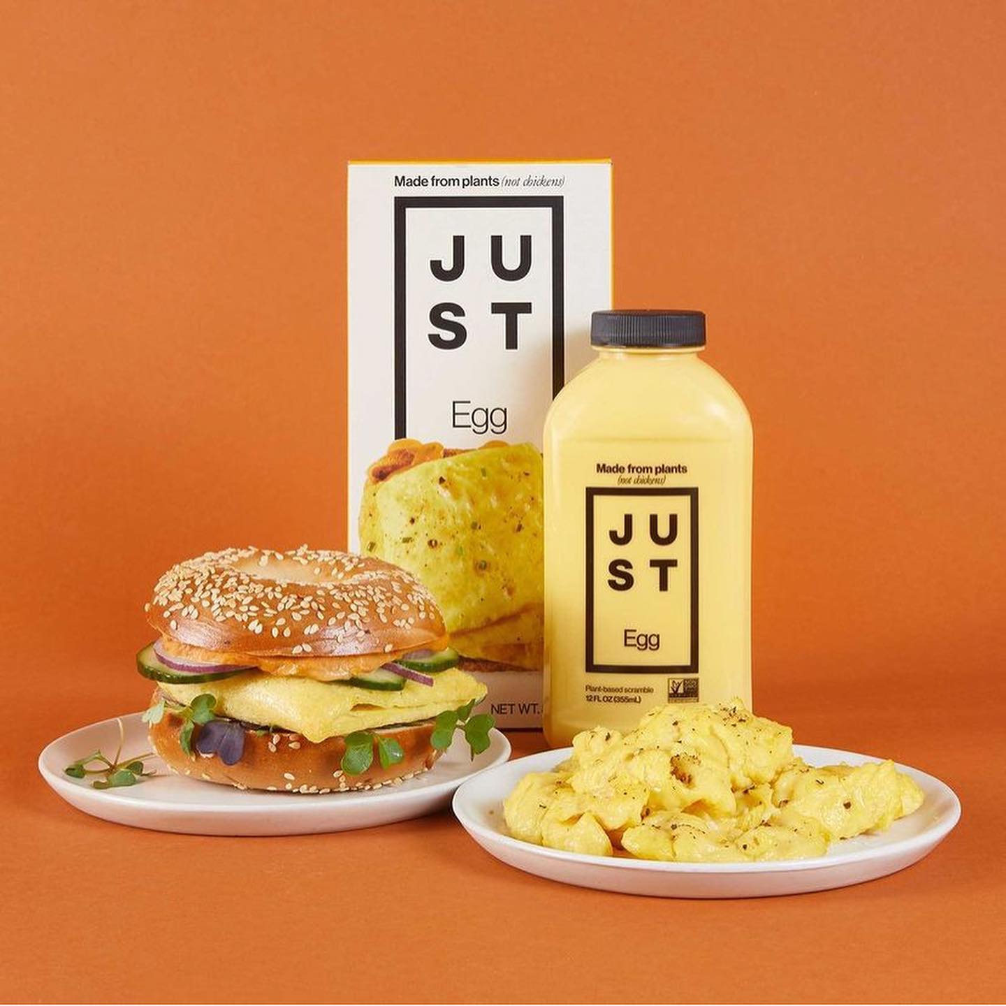 just egg bottle with a plate of burger and scrambled eggs