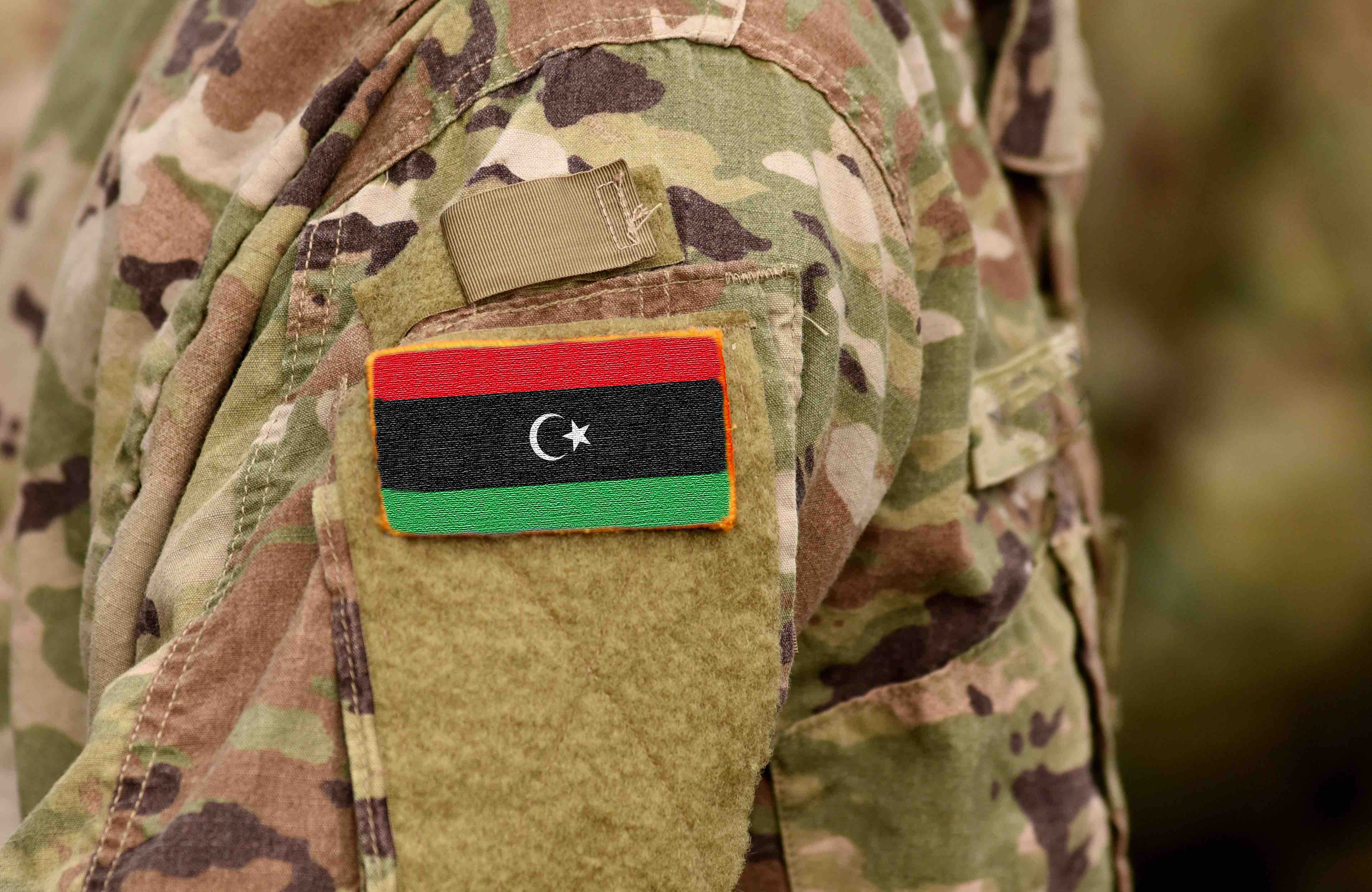 Libya flag on soldiers arm.