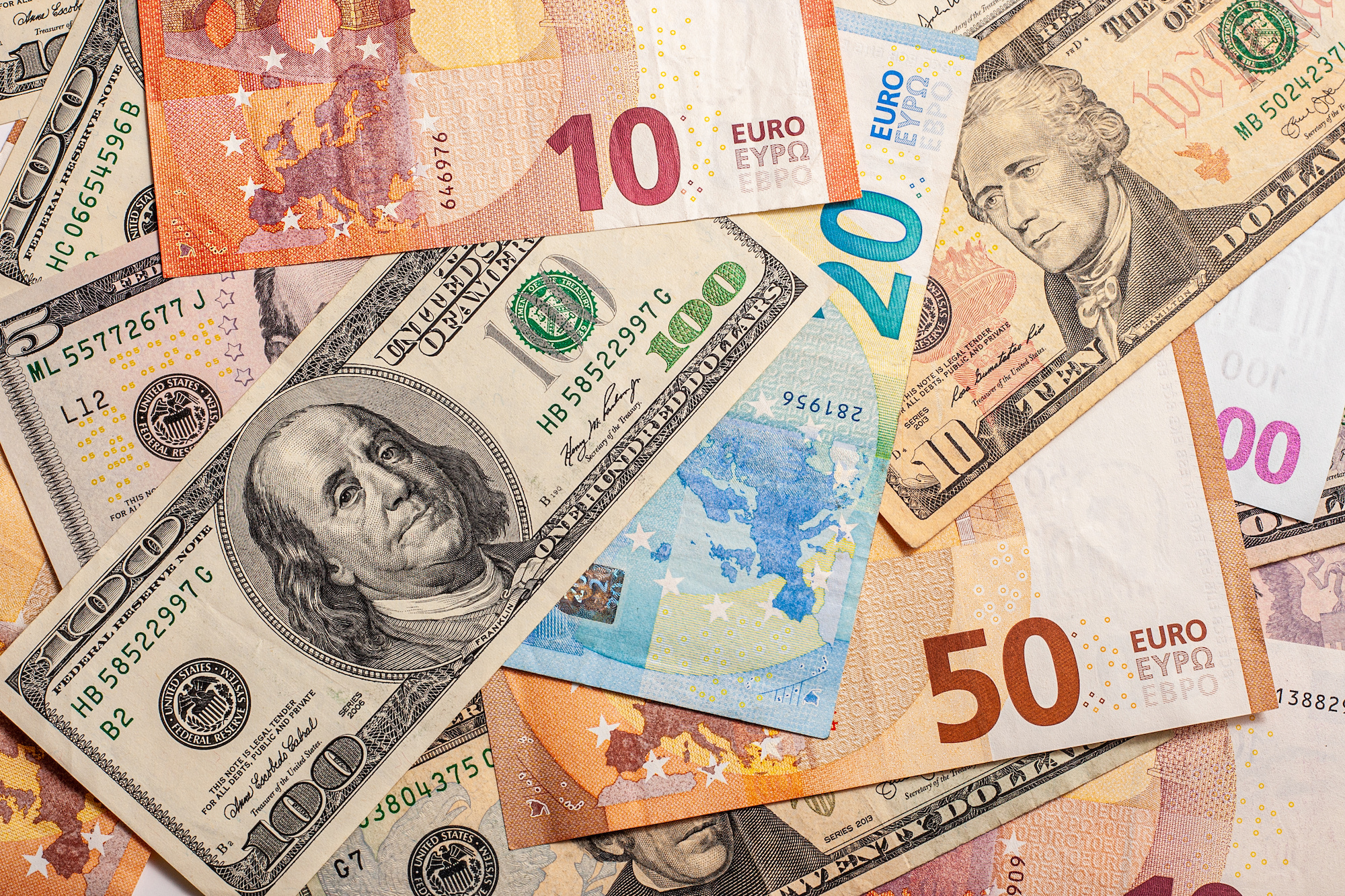 paper cash Euros and US dollars