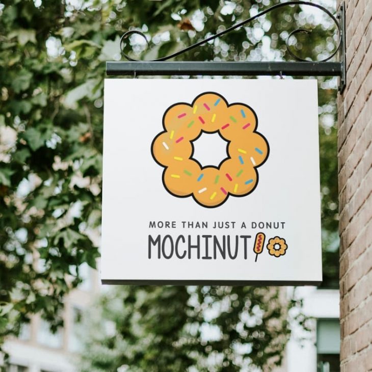 a mochinut brand shop sign against blurry background