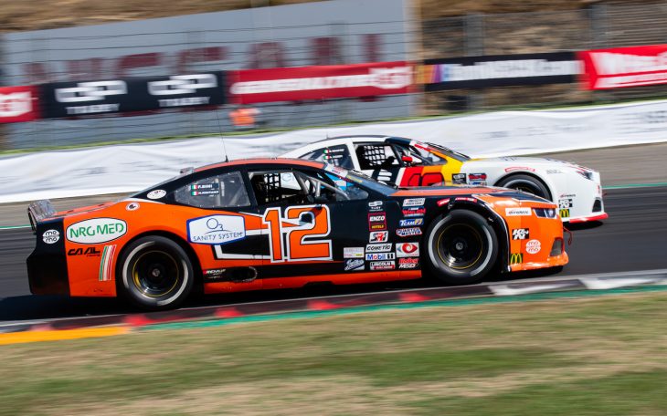 Close up of cars challenging overtaking during Nascar Euro championship race