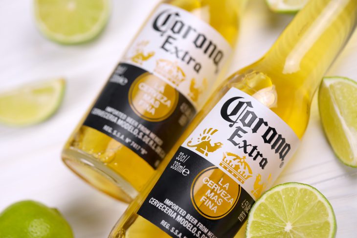 Bottles of Corona Extra Beer with lime slices