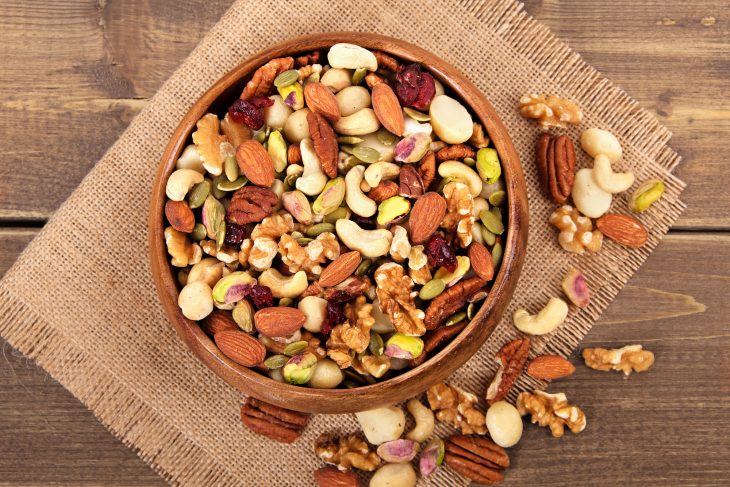 Mixed nuts in wooden bowl