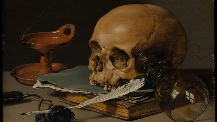 Skull with Quill writing history