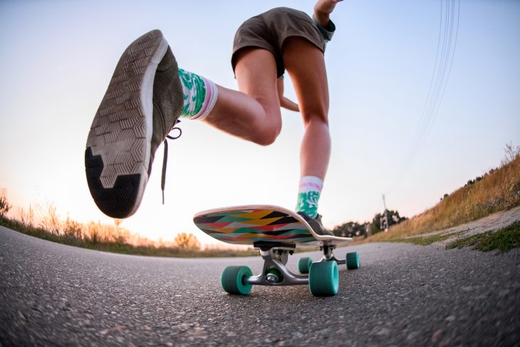 girl who is riding on skateboard