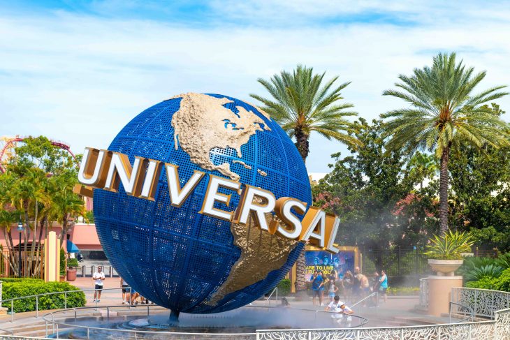 Universal Studios three dimensional logo during the daytime. The company is owned by Comcast through the Universal Filmed Entertainment Group