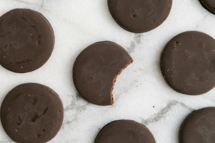 thin mints cookies on white marble background