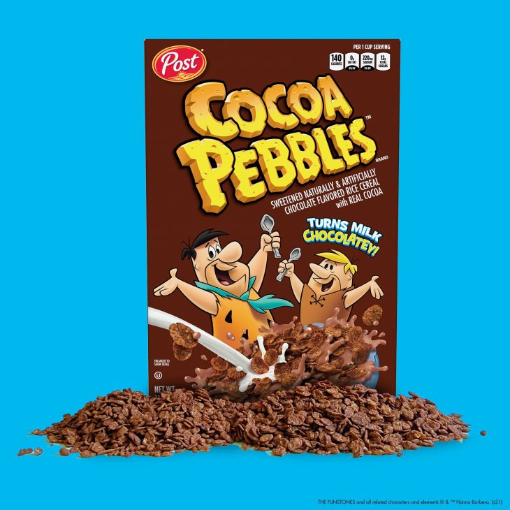 cocoa pebbles cereal on blue background