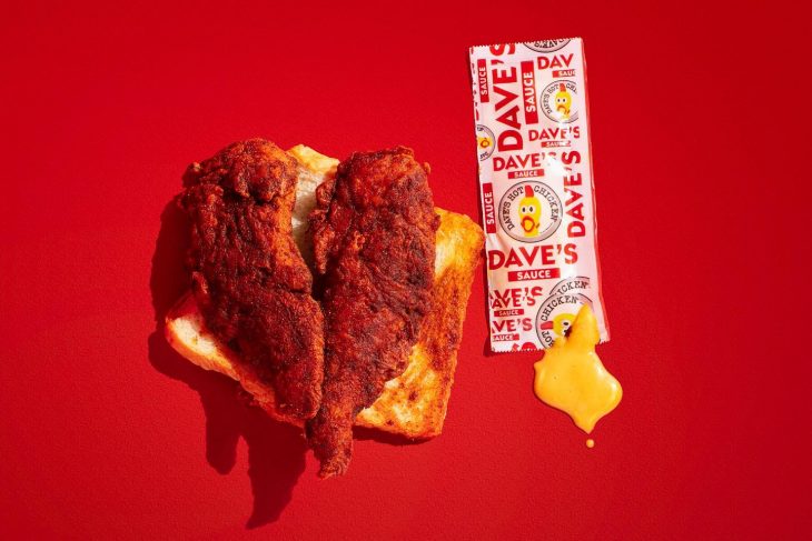 daves hot chicken and sauce red background