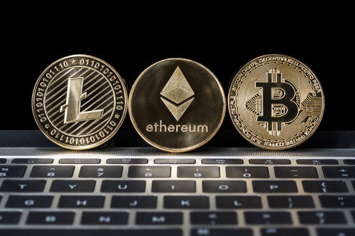 Cryptocurrency golden Bitcoin, Litecoin, Ethereum coins
